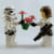 A Star Wars stormtrooper giving flowers to a lady stormtrooper
