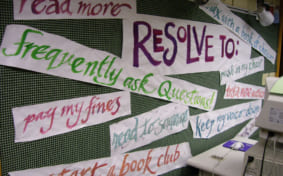 Bulletin board with New Year resolutions