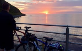 Sunset over the Sea of Japan with bicycle in foreground