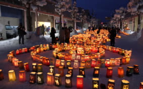 Lanterns on the ground lit up for the Takikawa Lantern Festival