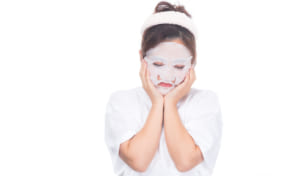 woman wearing a skin care mask on her face