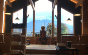 In front of Mt. Fuji is Japanese armor with the Takeda clan’s emblem